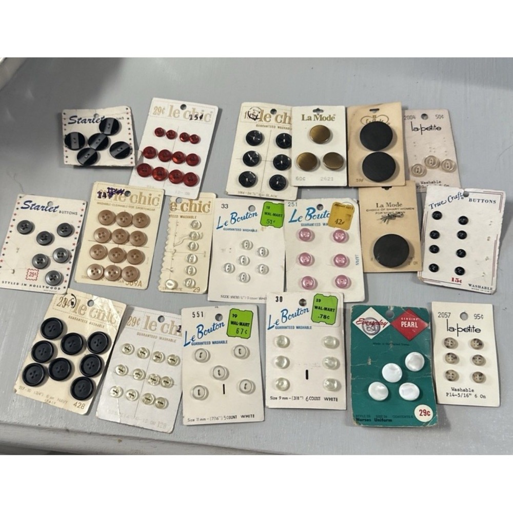 Large Group Of Vintage Buttons On There Boards